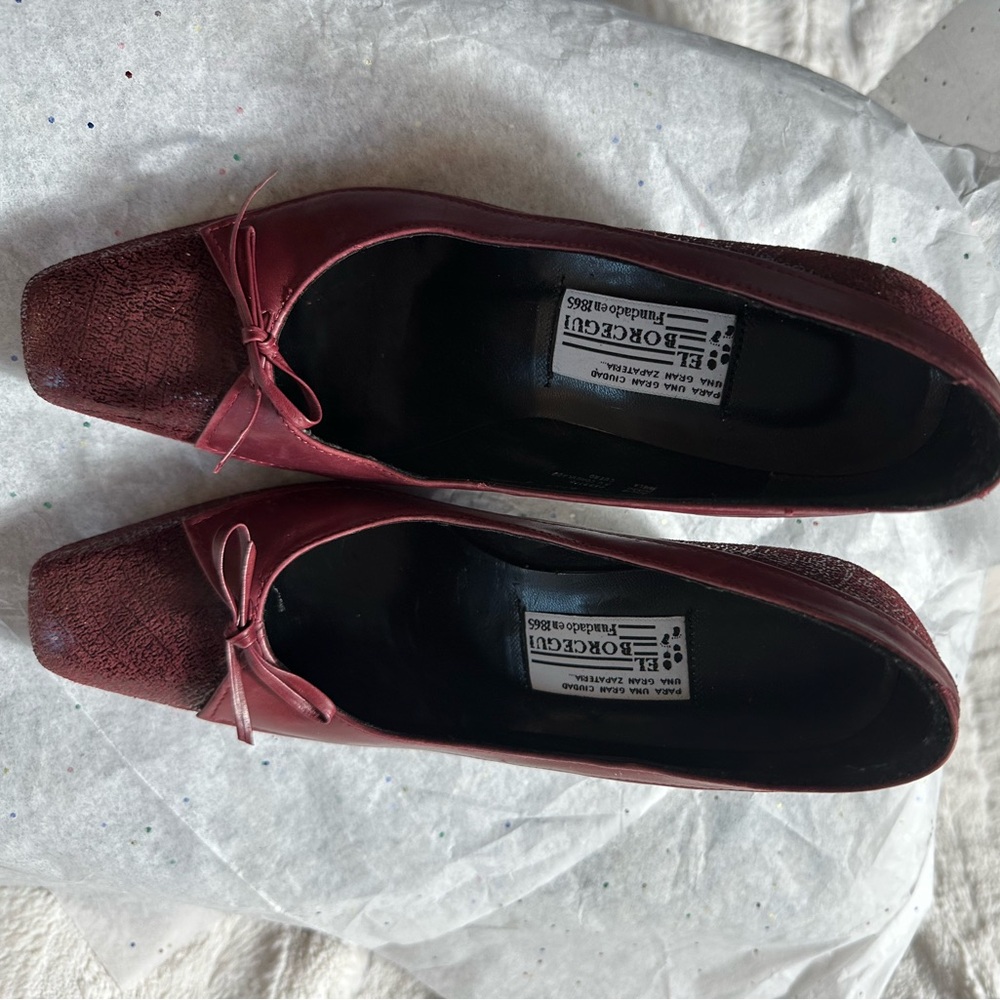 El Borcegui burgundy leather square toe pump with bow accent. Women's size 6.5/7